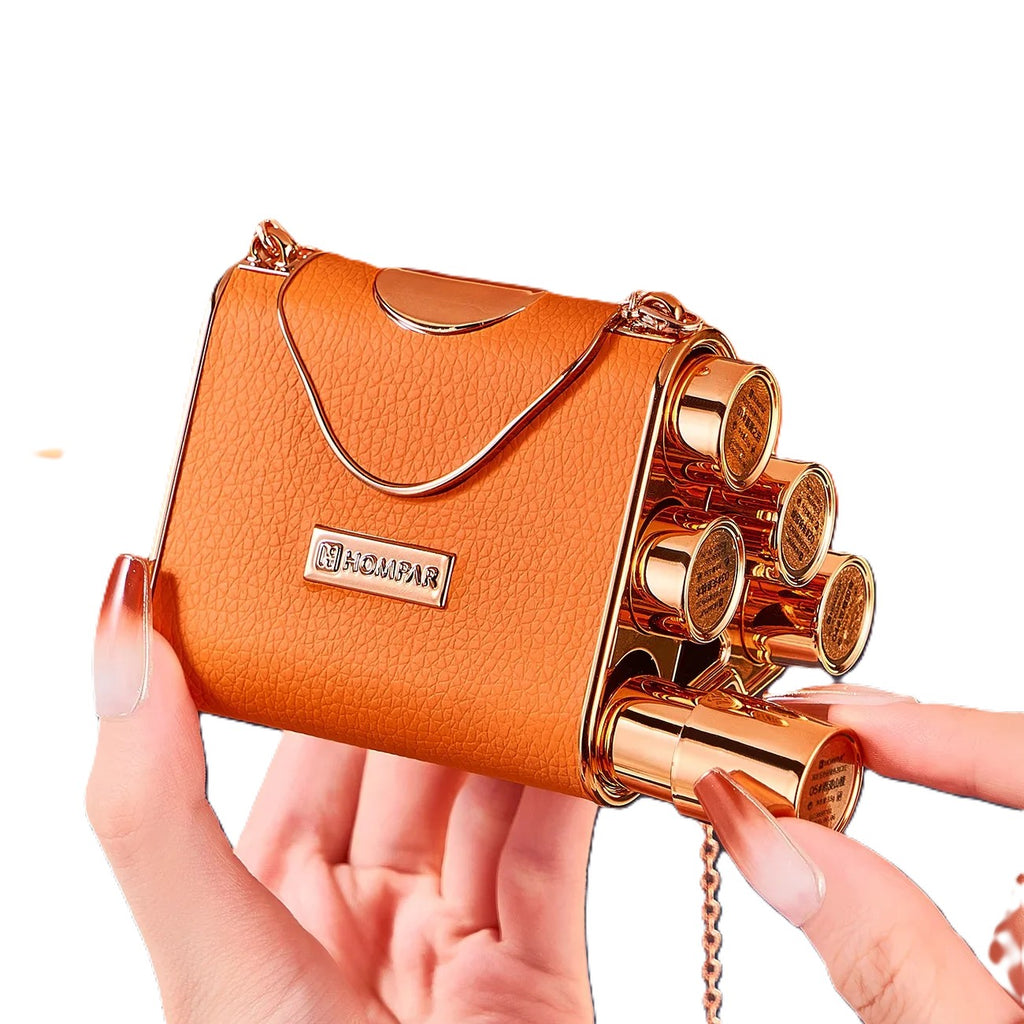 Velvet Matte Lipstick Gift Set 5-Piece orange leather chain bag with gold arch handle and circular charm hand holding bag and their hand removing lipstick from side slot