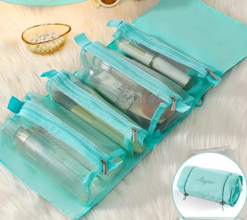 4-in-1 detachable cosmetic bag in sky blue unfolded showing 4 transparent zip pouches with skincare products