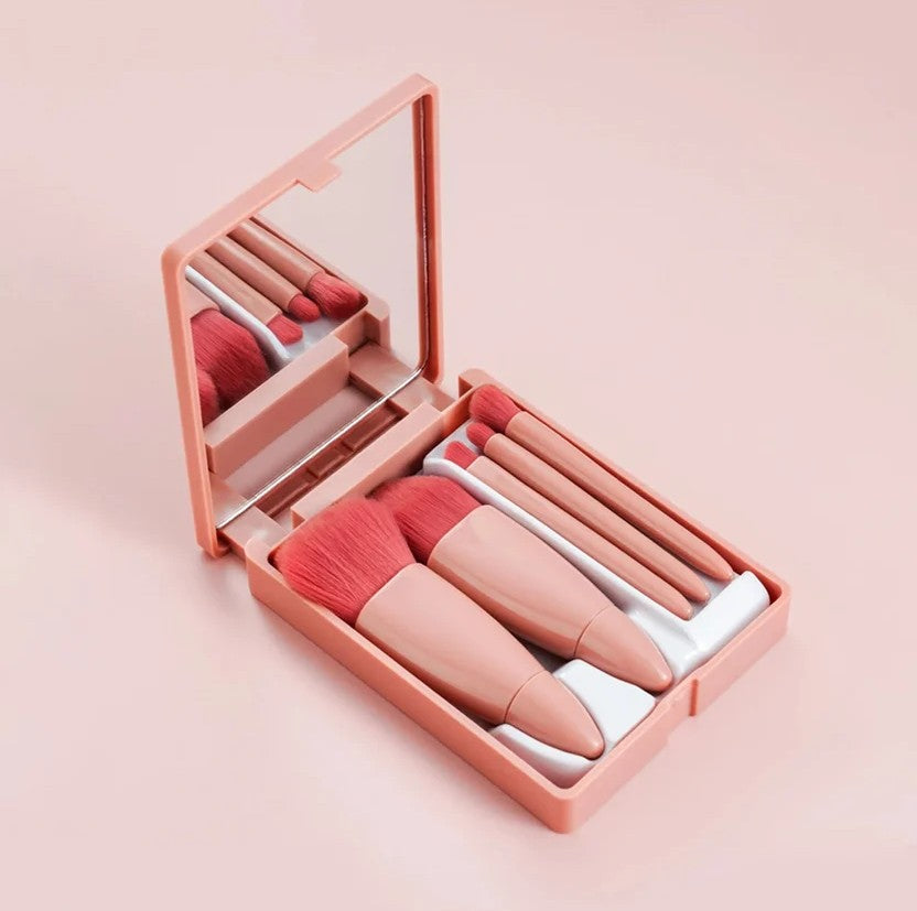Coffee pink mini travel makeup brush set open in foldable case with built-in mirror showing 5 brushes — portable beauty kit