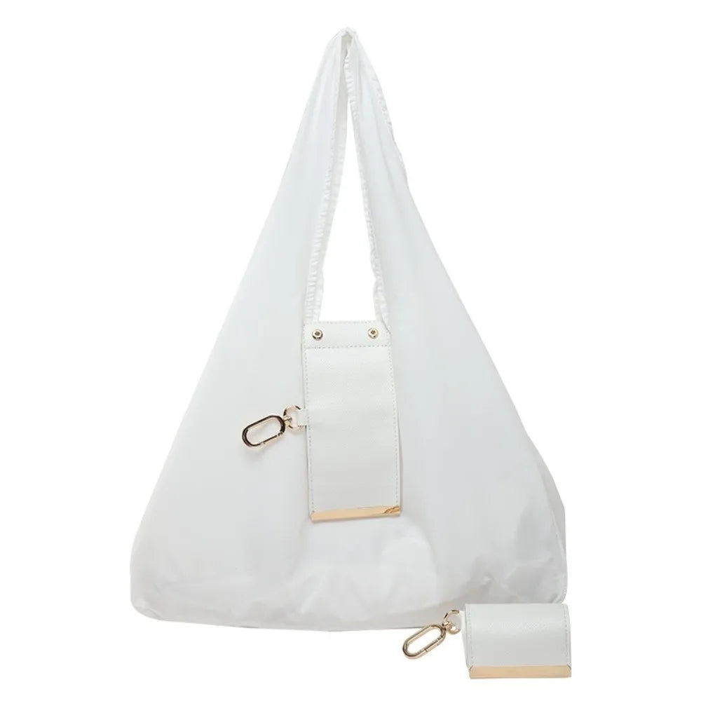Reusable Mini Keychain Tote Bag in White – foldable eco-friendly shopping bag with lux leather-look finish