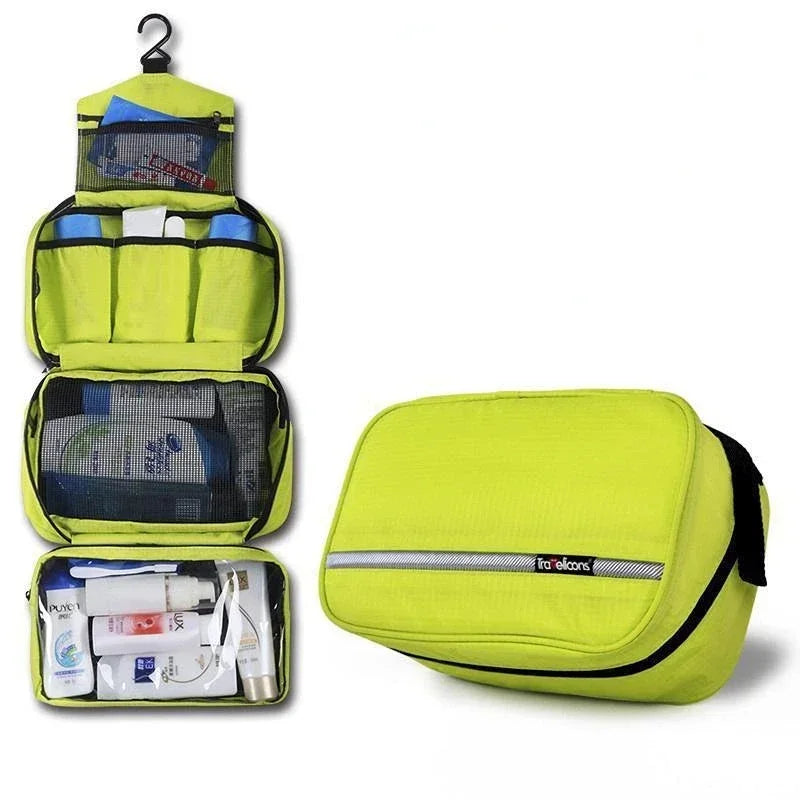 Green hanging toiletry bag unrolled with toiletries next to the zipped closed bag 