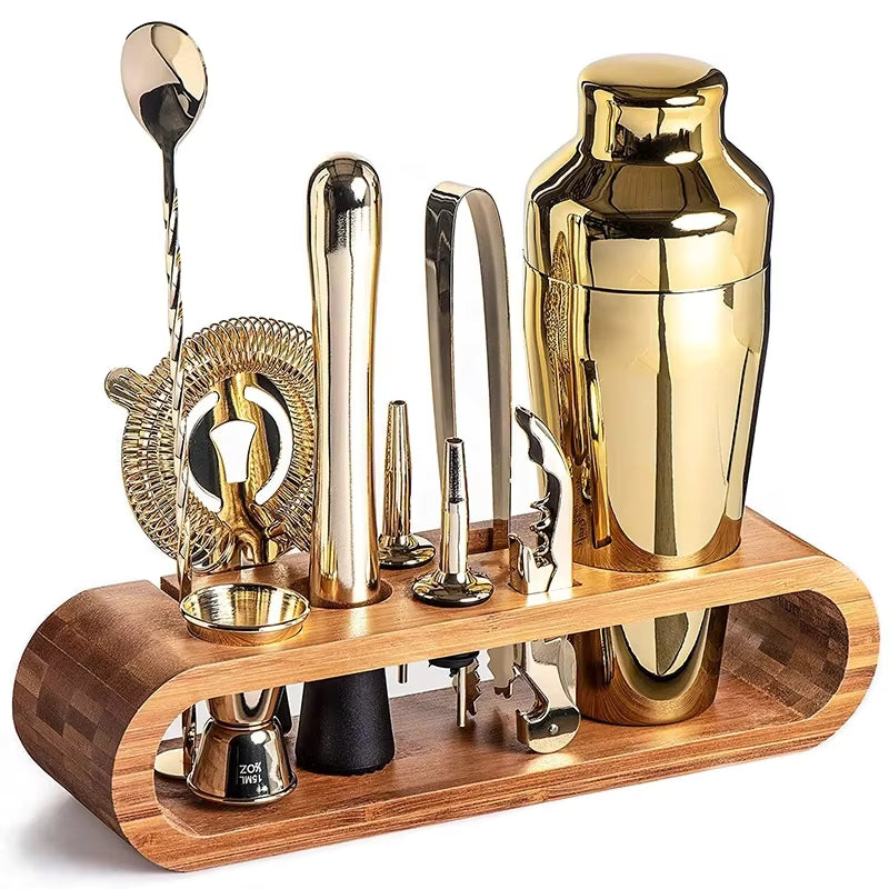MiniSolutions 10-piece bartender kit in gold plated finish displayed on bamboo stand against white background