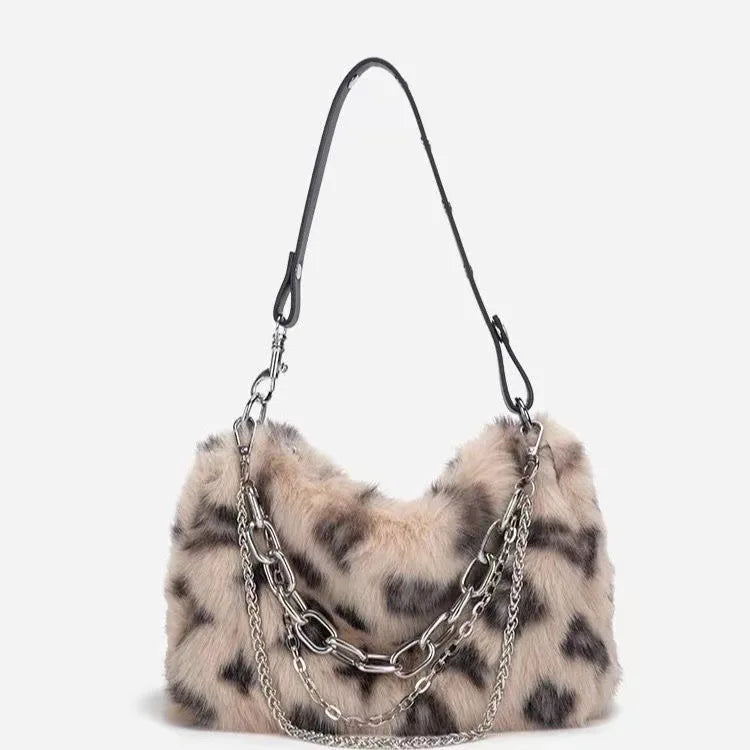 Faux fur leopard print shoulder bag in  yellow with removable double silver chain and adjustable strap — front view