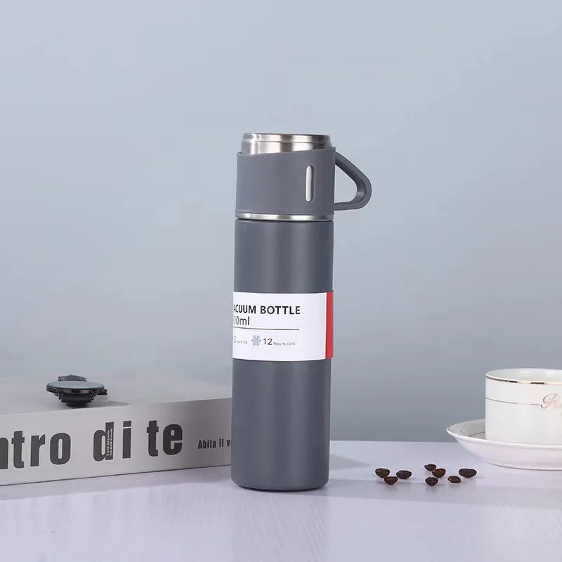 500ml stainless steel vacuum flask in Grey with cup lid showing vacuum bottle label