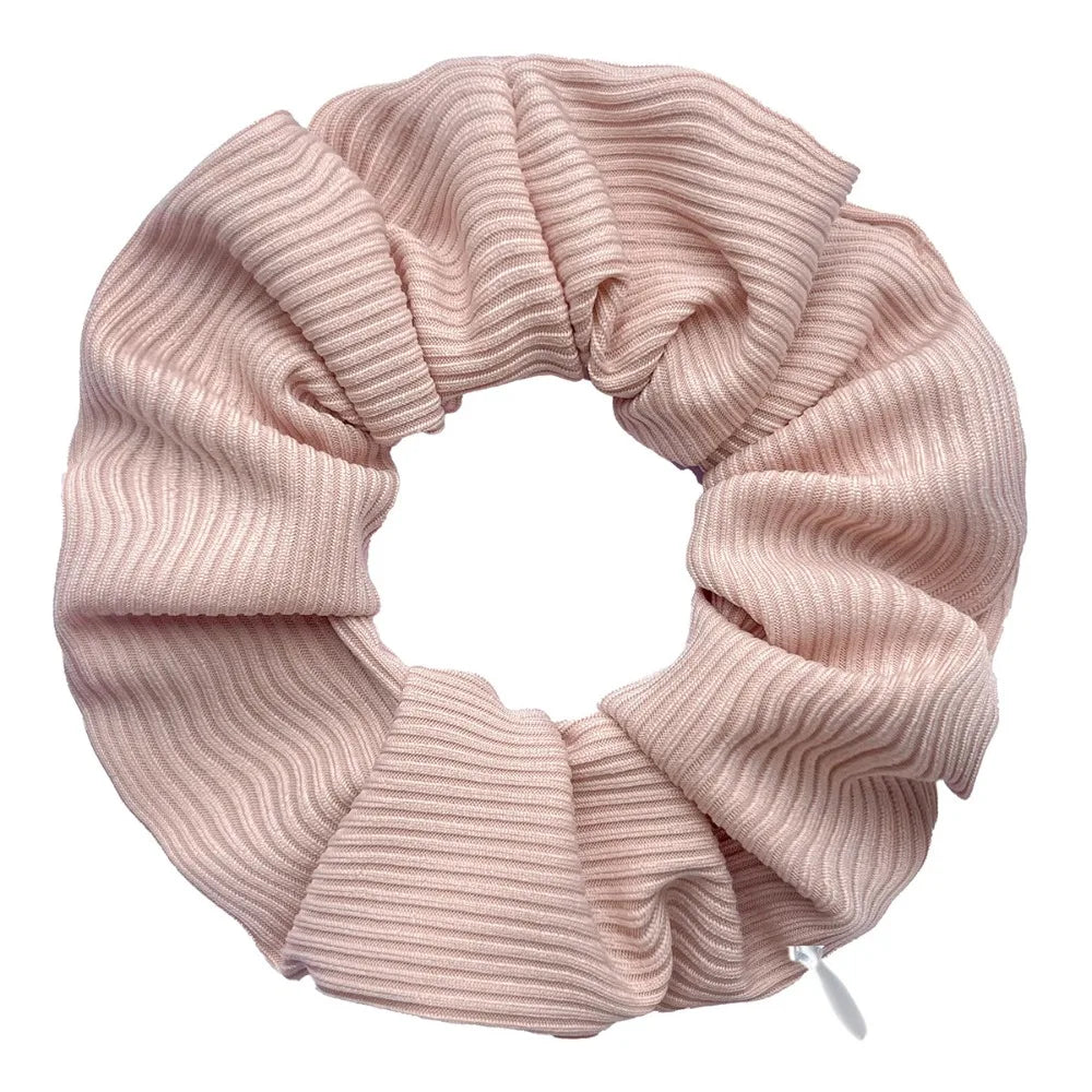 Hidden closure hair scrunchie in blush pink ribbed knit with zipper storage pocket