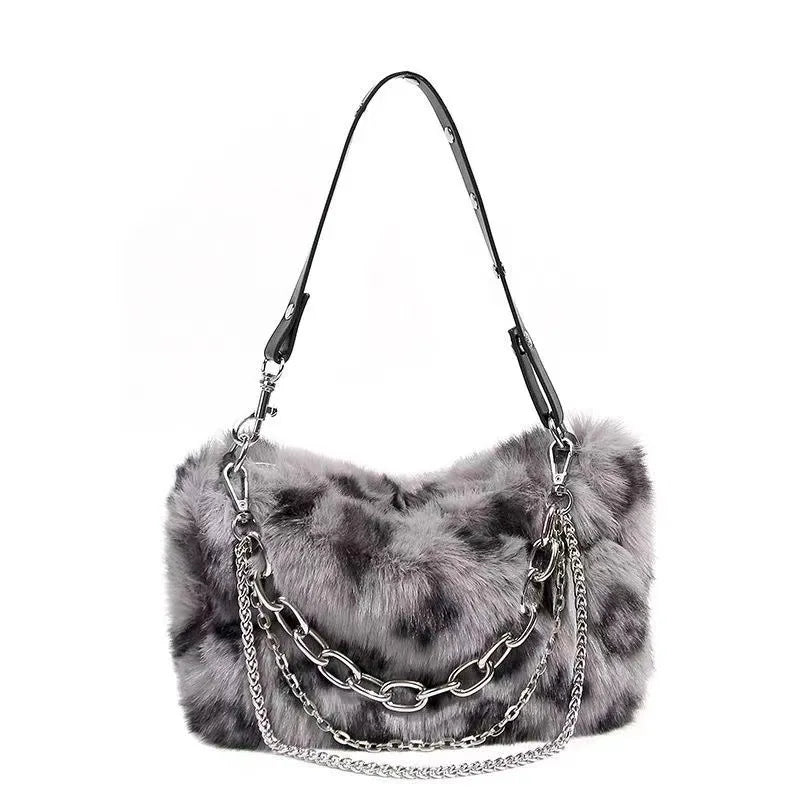 Faux fur leopard print shoulder bag in grey with removable double silver chain and adjustable strap — front view