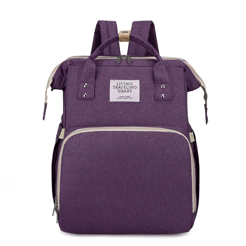 Purple: 2-in-1 nappy bag backpack in purple, front view