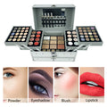 Silver aluminium train case makeup kit fully opened showing fold-out eyeshadow trays, lipsticks, face powders and blush, with example makeup looks for powder, eyeshadow, blush and lipstick