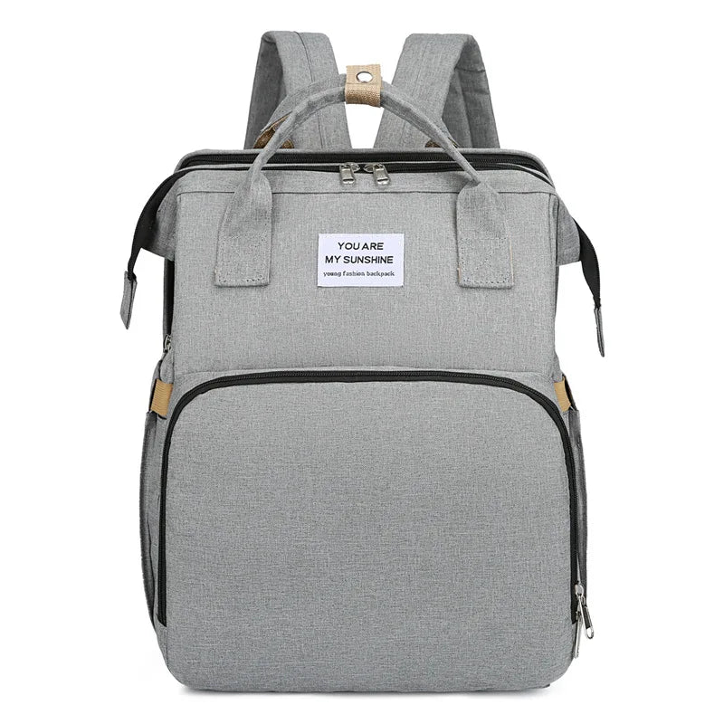 Grey: 2-in-1 nappy bag backpack in grey, front view