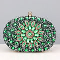 Flower rhinestone oval clutch purse in green with central floral crystal design and detachable gold chain strap