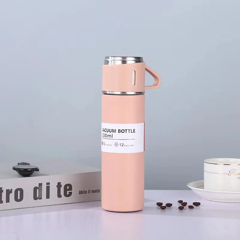 500ml stainless steel vacuum flask in Pink with cup lid showing vacuum bottle label