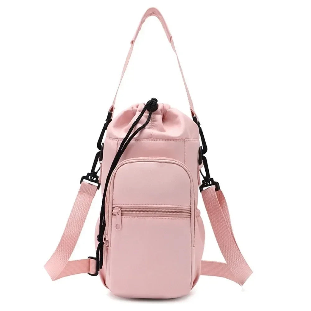 Insulated water bottle bag in pink with adjustable crossbody strap and front zip phone pocket