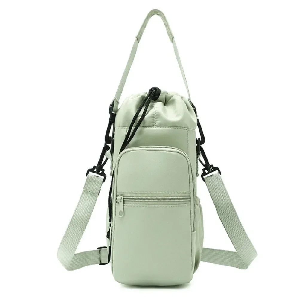 Insulated water bottle bag in green with adjustable crossbody strap and front zip phone pocket