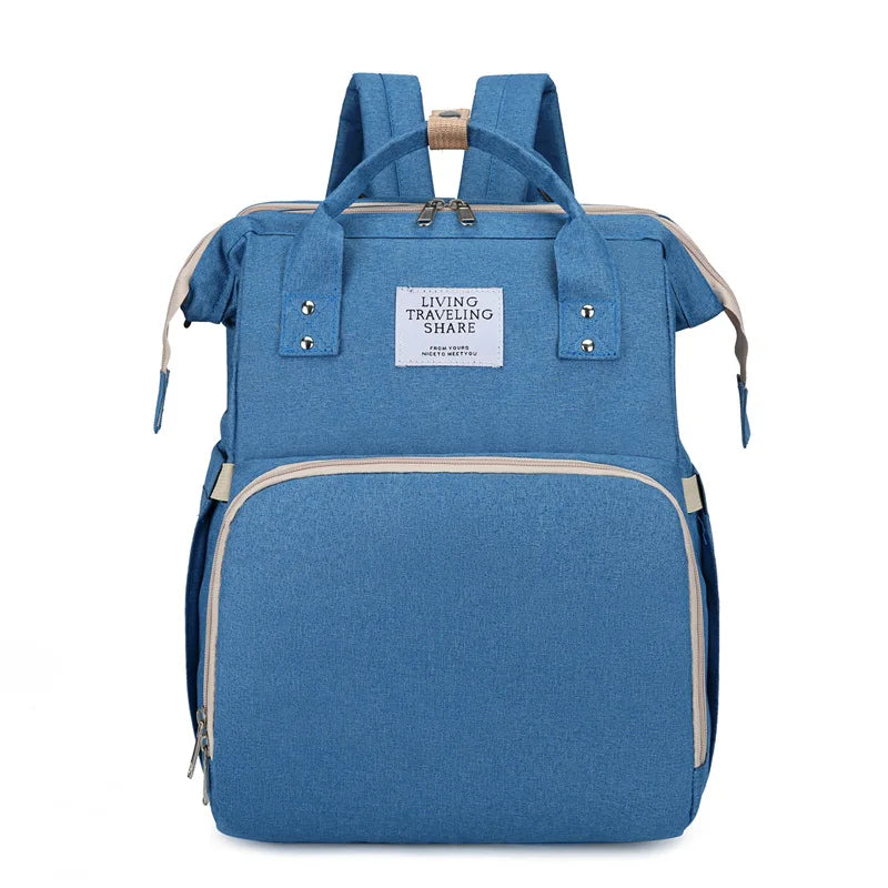 Light Blue 2-in-1 nappy bag backpack in light blue, front view