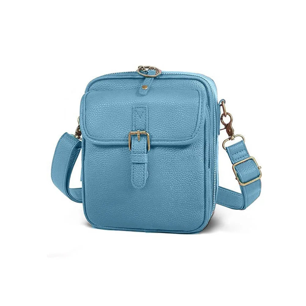 Vintage PU leather crossbody bag in sky blue with gold-tone buckle front pocket and adjustable crossbody strap