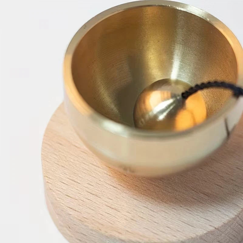 Close-up of the mini brass singing bowl