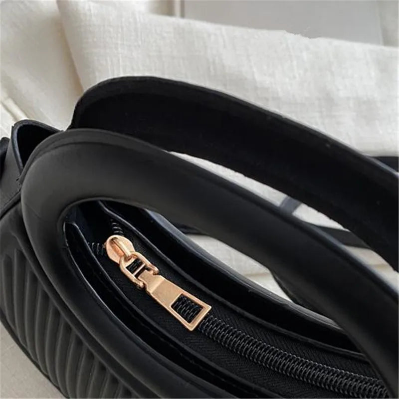 Chic Mini Half‑Moon Handbag – Stylish Round Handle Purse with Adjustable Crossbody Strap
