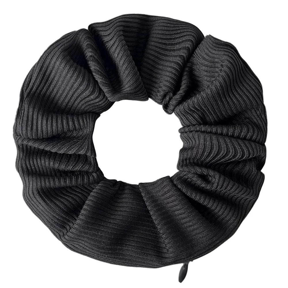 Hidden closure hair scrunchie in black ribbed knit with zipper storage pocket