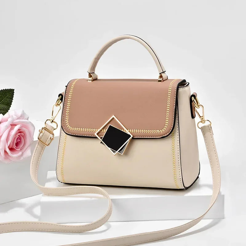 Cream beige colour block PU leather shoulder bag with gold metal top handle and adjustable crossbody strap