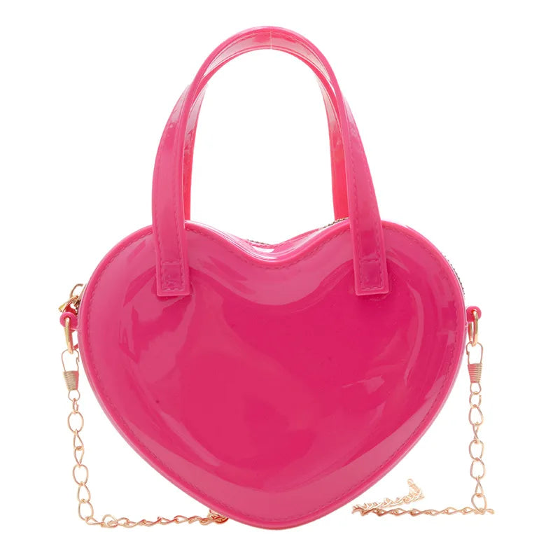 Rose Pink heart-shaped handbag front view with twin handles and gold chain strap