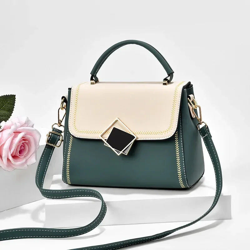 Forest green colour block PU leather shoulder bag with gold metal top handle and adjustable crossbody strap