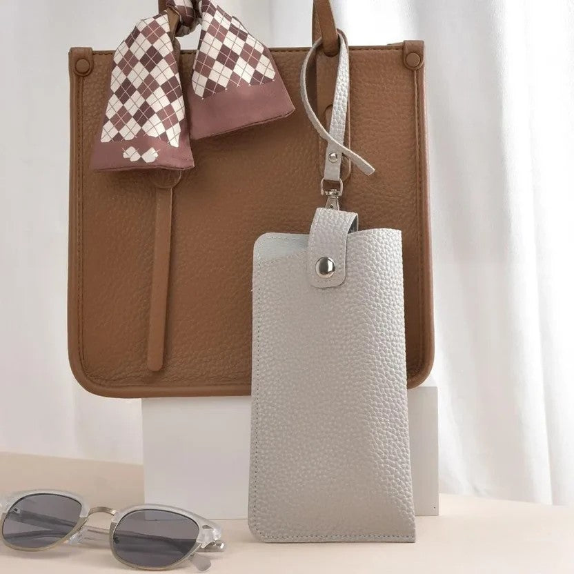 MiniSolutions rectangle PU leather glasses case in grey with metal snap closure and wrist strap