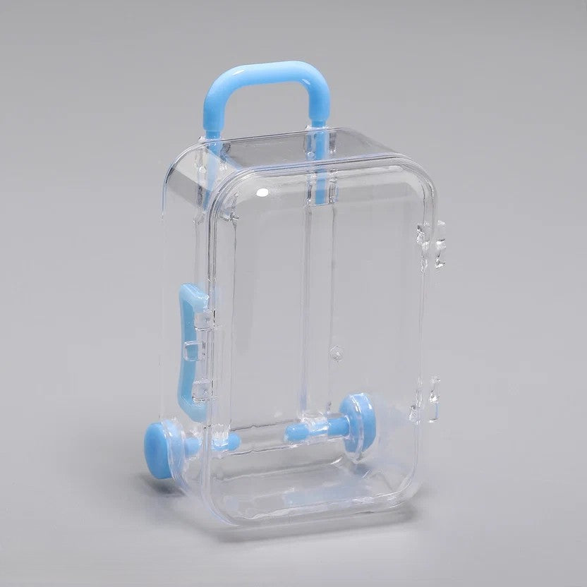 Transparent acrylic mini suitcase display box with blue color-matched handle, wheels, and latch