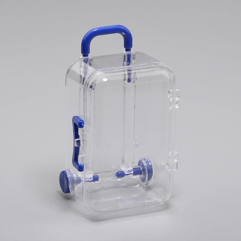 Transparent acrylic mini suitcase display box with dark blue color-matched handle, wheels, and latch