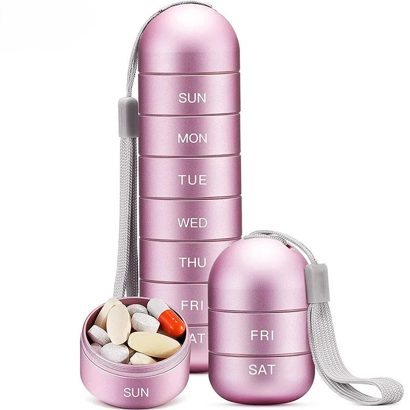 Pink aluminium 7-day pill organiser with strap, waterproof weekly medicine box