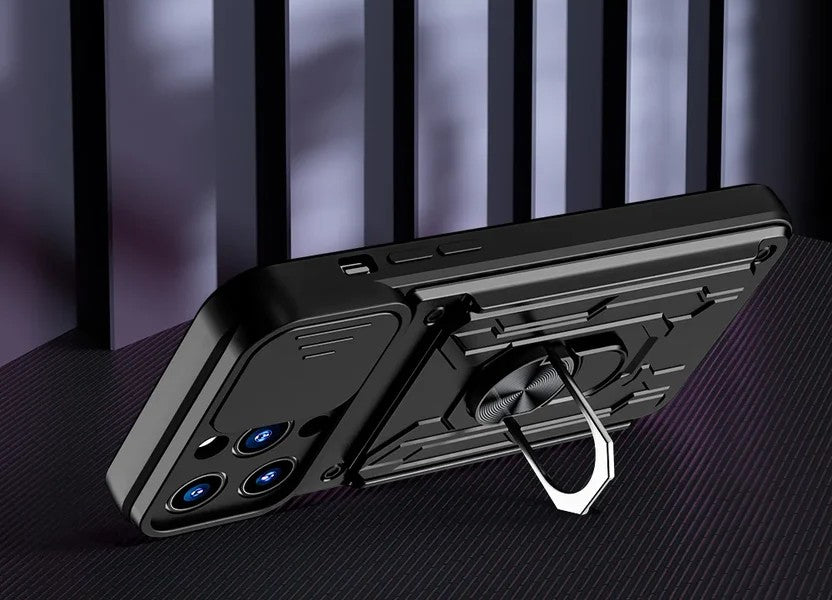 Black shockproof iPhone case side view with metal ring kickstand extended as stand on dark background