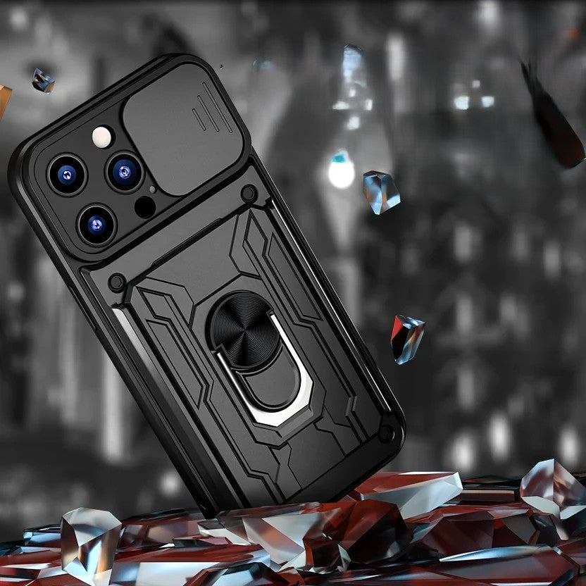 Black shockproof iPhone case with sliding camera cover and ring kickstand floating on dark background with crystal shards