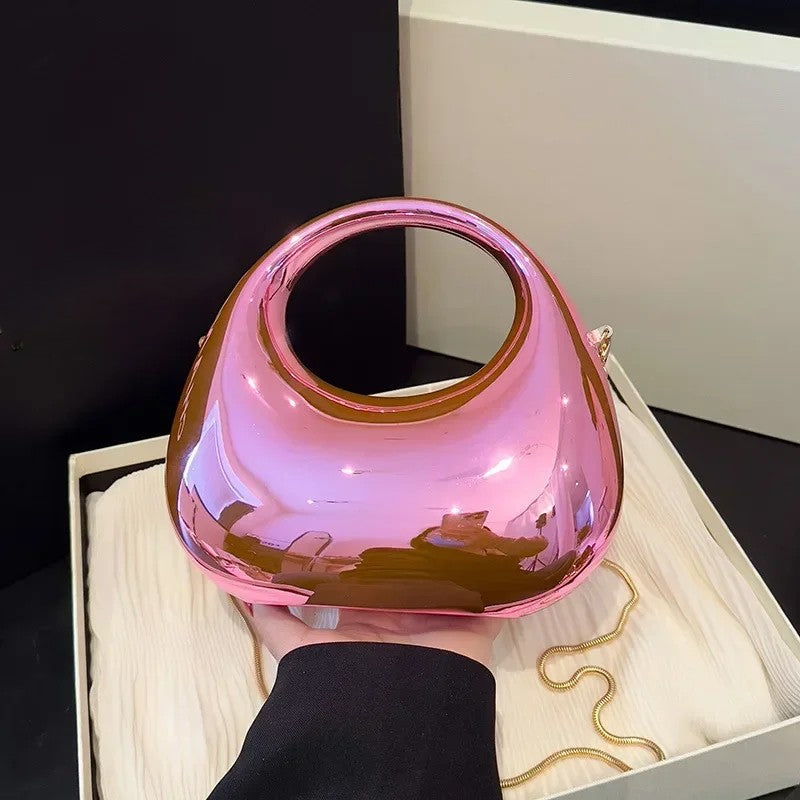 Mini acrylic dome bag in purple with circular top handle and detachable gold chain strap