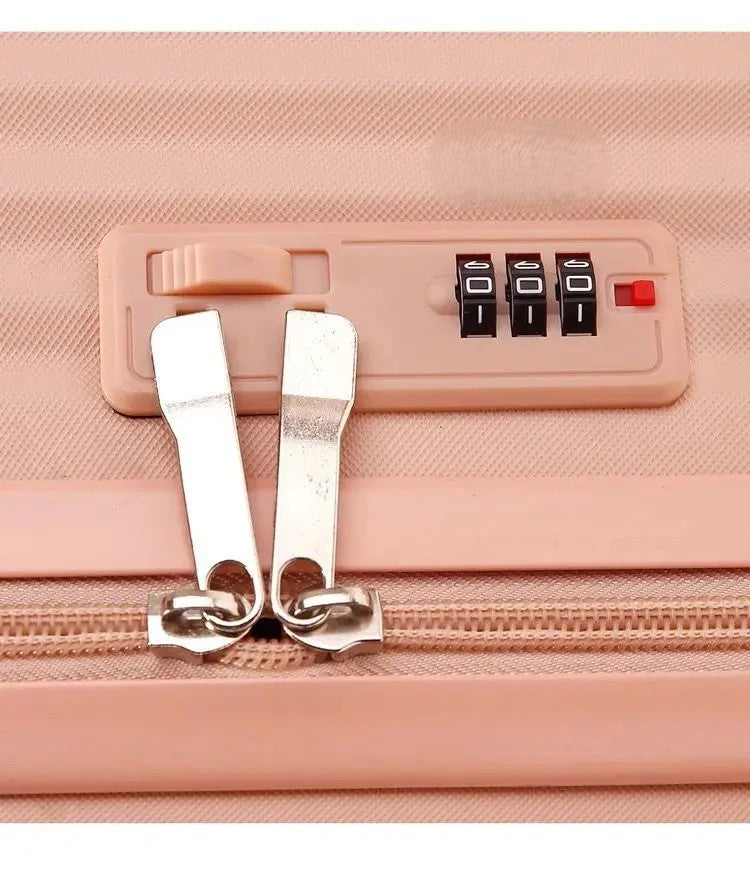 Lightweight Mini Travel Suitcase Cosmetic Box close-up of 3-digit combination lock and dual zipper pulls — Pink hard shell case"